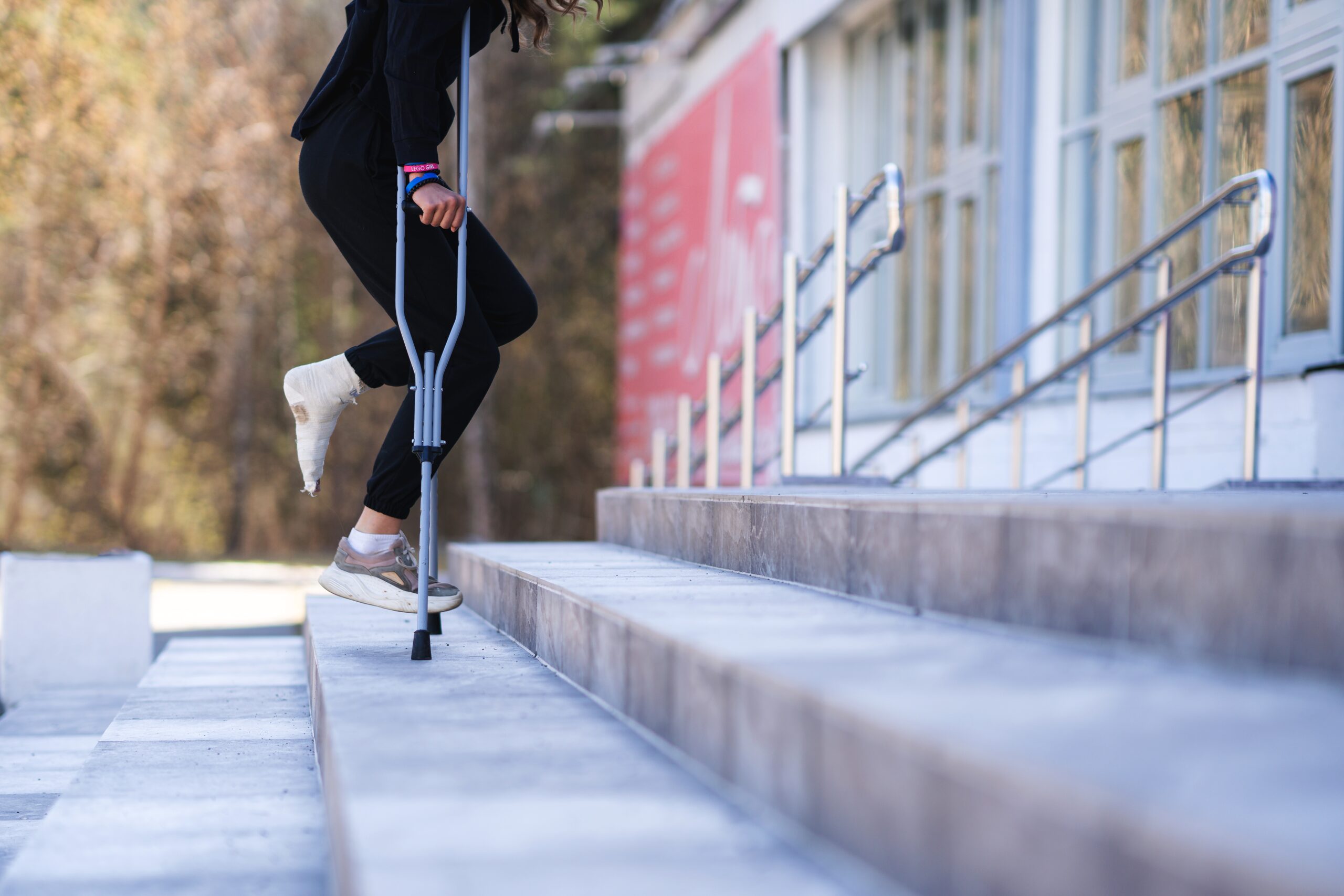 young-woman-with-a-broken-ankle-on-crutches-2025-01-09-01-10-44-utc